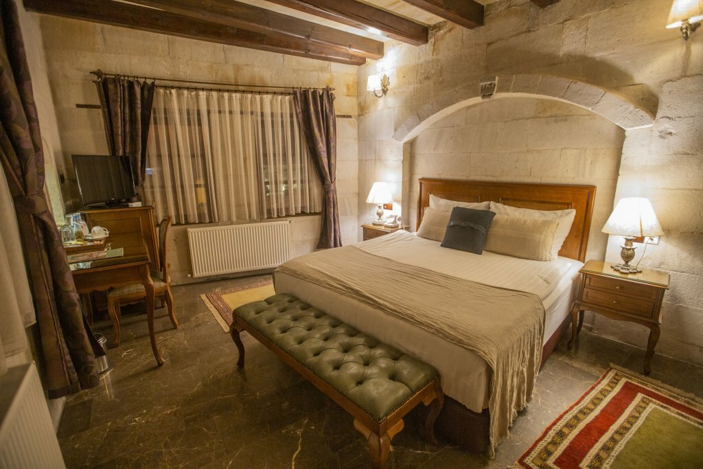 Отель в скале Каппадокия, Гёреме, Турция- Artemis Cave Suites.